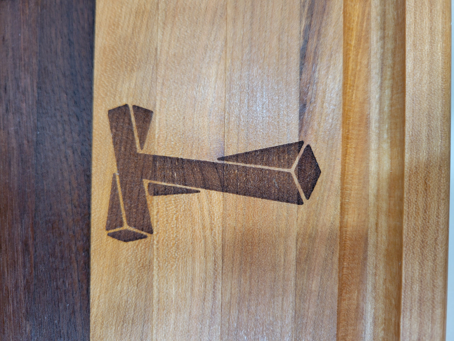 Engraved letter T on cheery