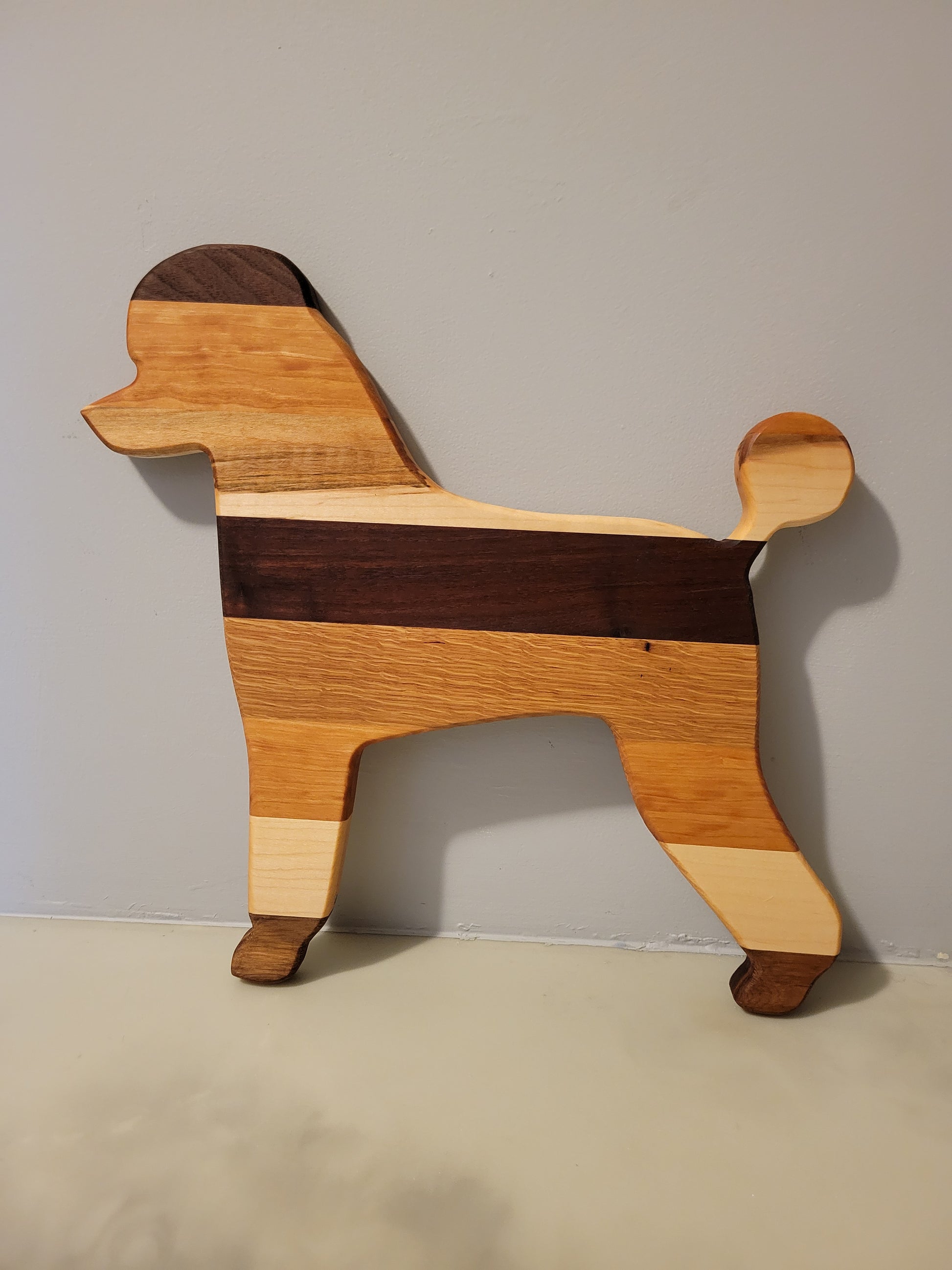 Poodle charcuterie board handmade with oak, walnut, maple and cherry.