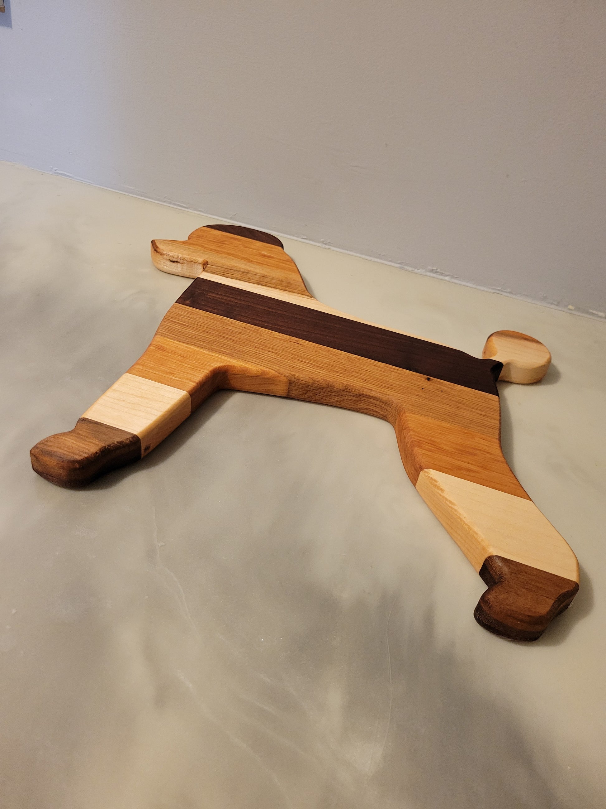 Poodle Dog charcuterie board handmade with oak, walnut, maple and cherry.