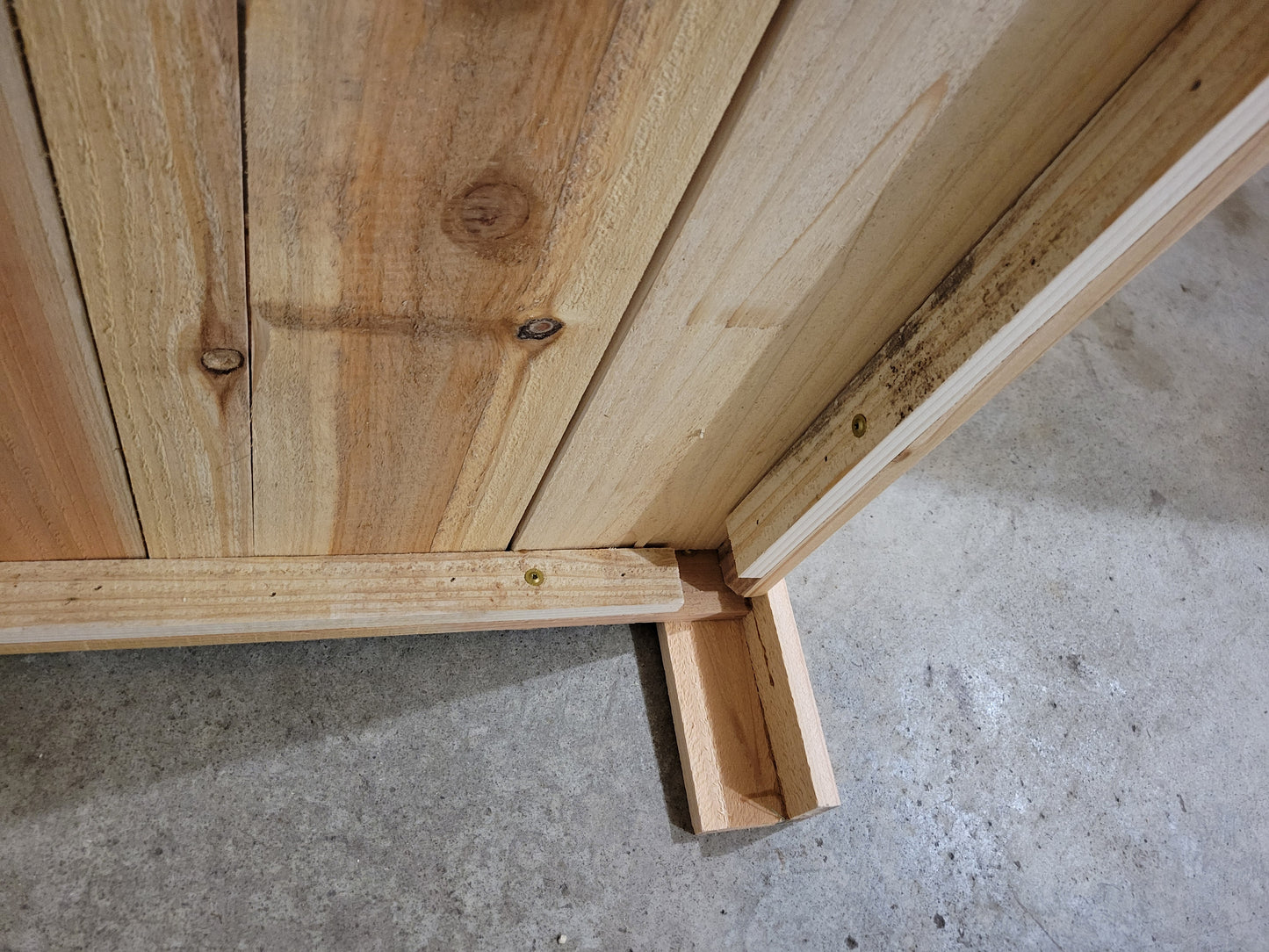 Wooden structure on a concrete floor